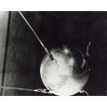 Sputnik, the world's first artificial satellite, announces the Soviet-US space race, October 1957