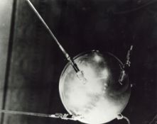 Sputnik, the world's first artificial satellite, announces the Soviet-US space race, October 1957