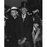 Weegee (1899-1968). Easter Sunday, Harlem, 1940. Gelatin silver print, printed later, annotated in