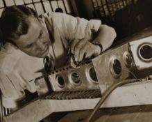Margaret Bourke-White (1904-1971) - Man Doing Metalwork, ca.1934 Warm-toned gelatin silver print,