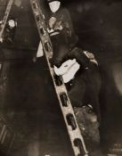 Weegee (1899-1968) - Untitled (Firemen Rescue), ca.1937 Ferrotyped gelatin silver print,