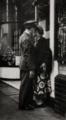 Bert Hardy (1913-1995) - A Couple Talking in Piccadilly, ca.1950 Gelatin silver print with   Bert