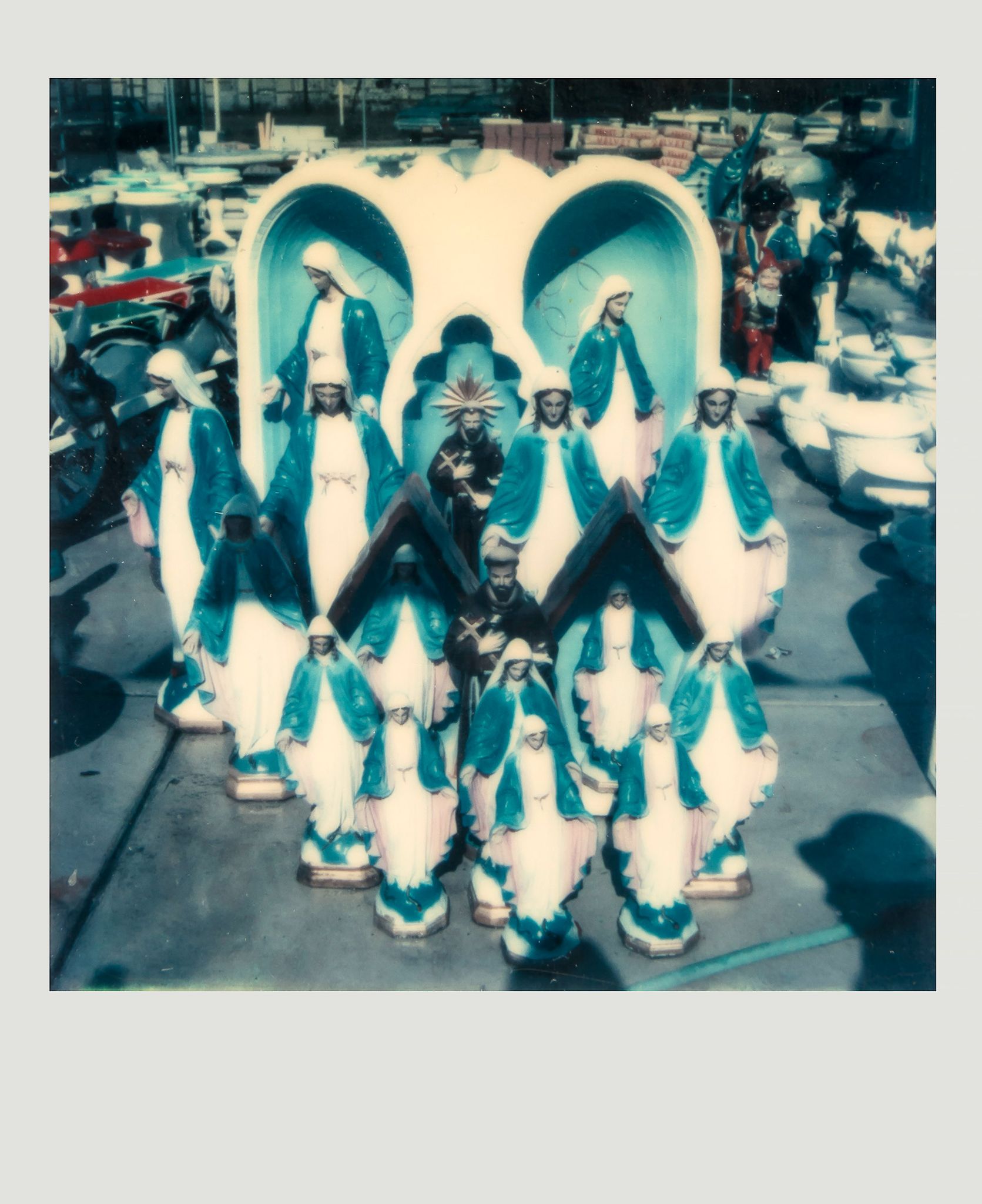 Walker Evans (1903-1975) - Untitled (Group of Virgin Mary and Jesus Lawn Ornaments), 1973 Unique