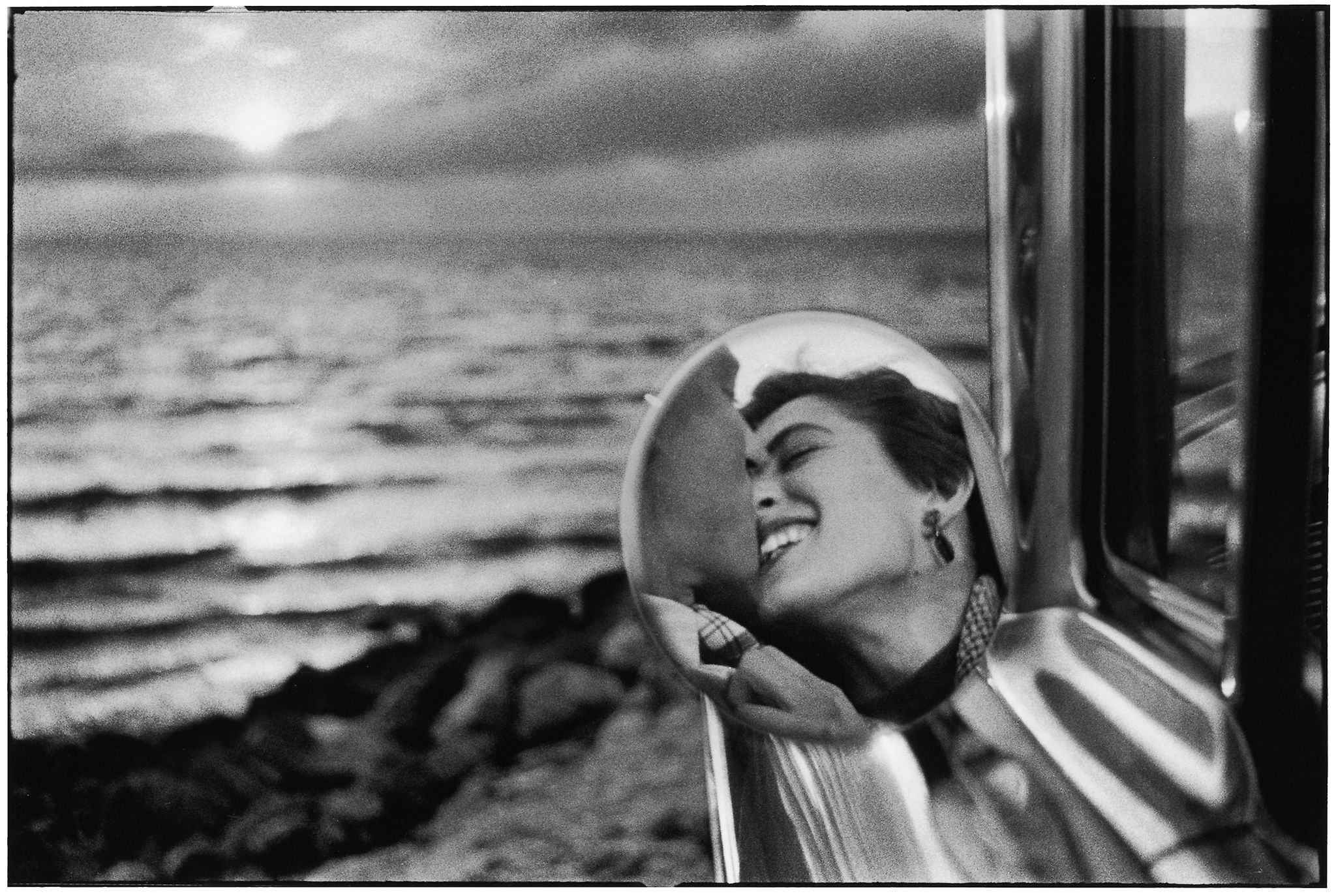 Elliott Erwitt (b.1928) - Santa Monica, California, 1955 Gelatin silver print, printed later, signed