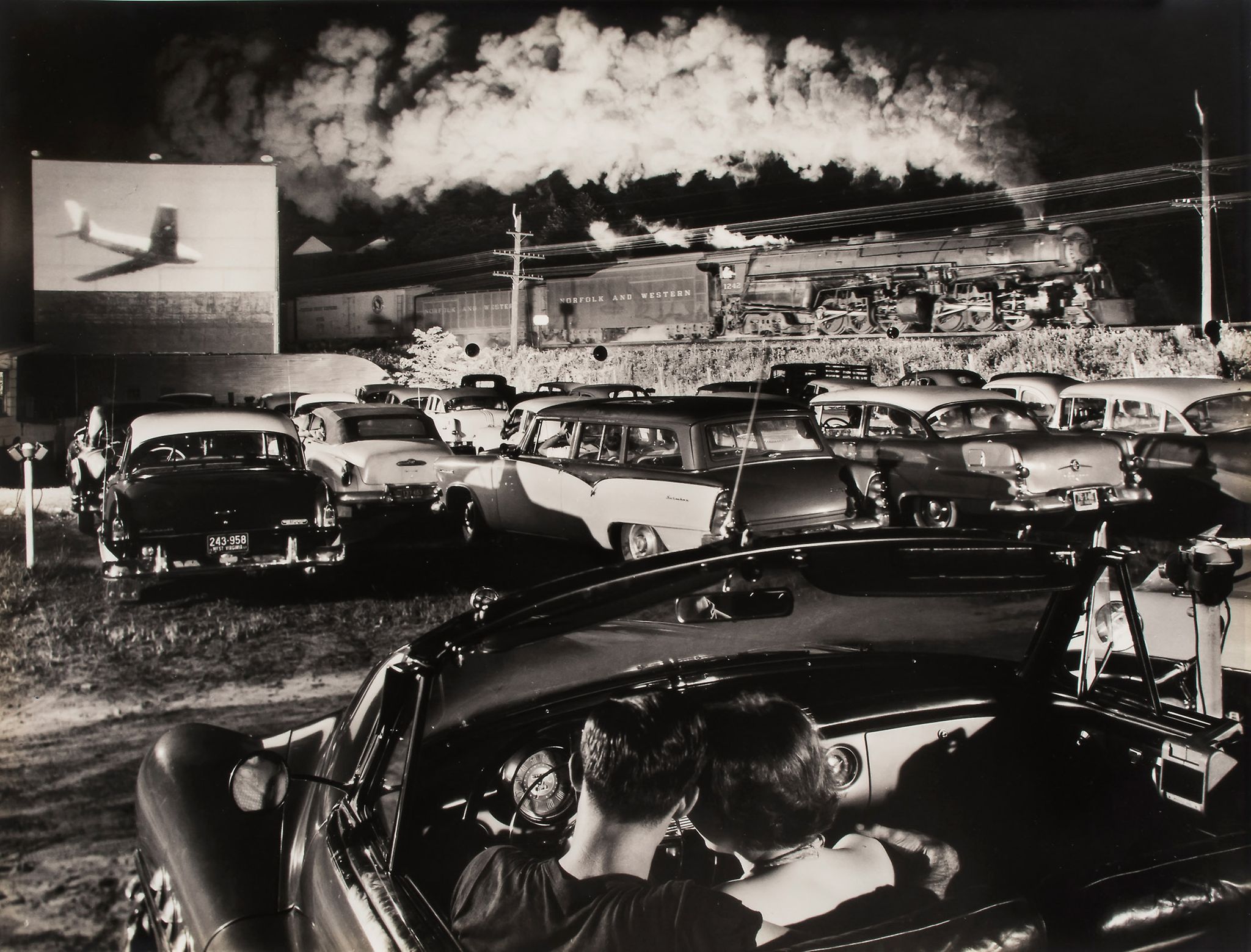 O. Winston Link (1914-2001) - Hot Shot, Eastbound at the Iaeger Drive-In, West Virginia, 1956