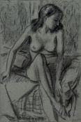 John Buckland-Wright (1897–1954) - Nude sitting on bed, 1947 black chalk on blue paper, signed and