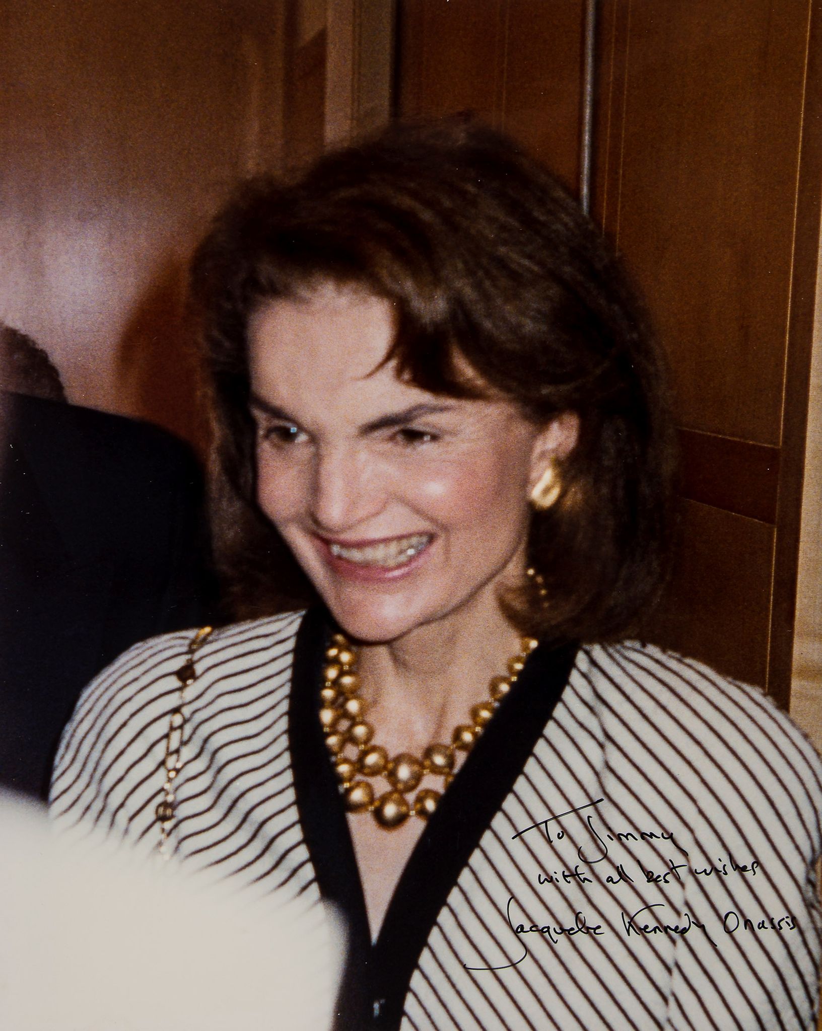 ONASSIS, JACQUELINE KENNEDY - Colour 10 x 8", head and shoulders candid photograph of a smiling...