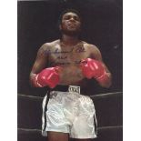 ALI, MUHAMMAD, JOE FRAZIER & GEORGE FOREMAN - Group of signed photographs of Muhammad Ali and his