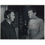TAYLOR, ELIZABETH & LAURENCE HARVEY - Two 8 X 10" black and white photographs from the set of the