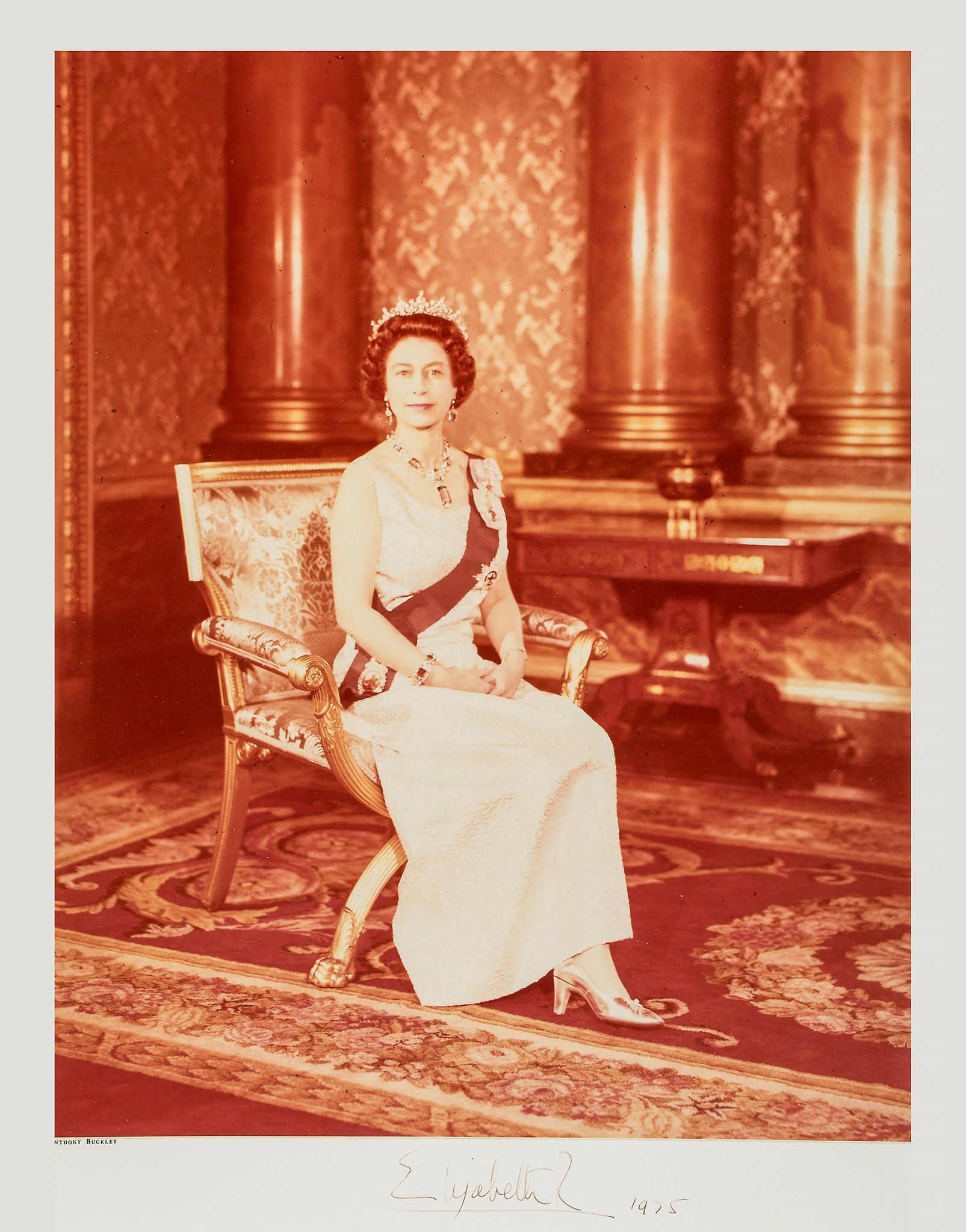 ELIZABETH II, QUEEN & PRINCE PHILIP - A. BUCKLEY - Pair of full length amber-toned photographs by