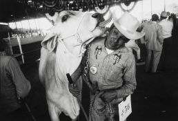 Garry Winogrand (1928-1984) - Rodeo, Man and the Cow, 1964 Gelatin silver print, signed in pencil