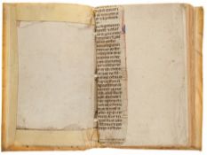 Two strips - from a decorated legal manuscript codex, in Latin on parchment  from a decorated