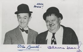 LAUREL, STAN & OLIVER HARDY - Signed photo card of Stan Laurel and Oliver Hardy in a famous