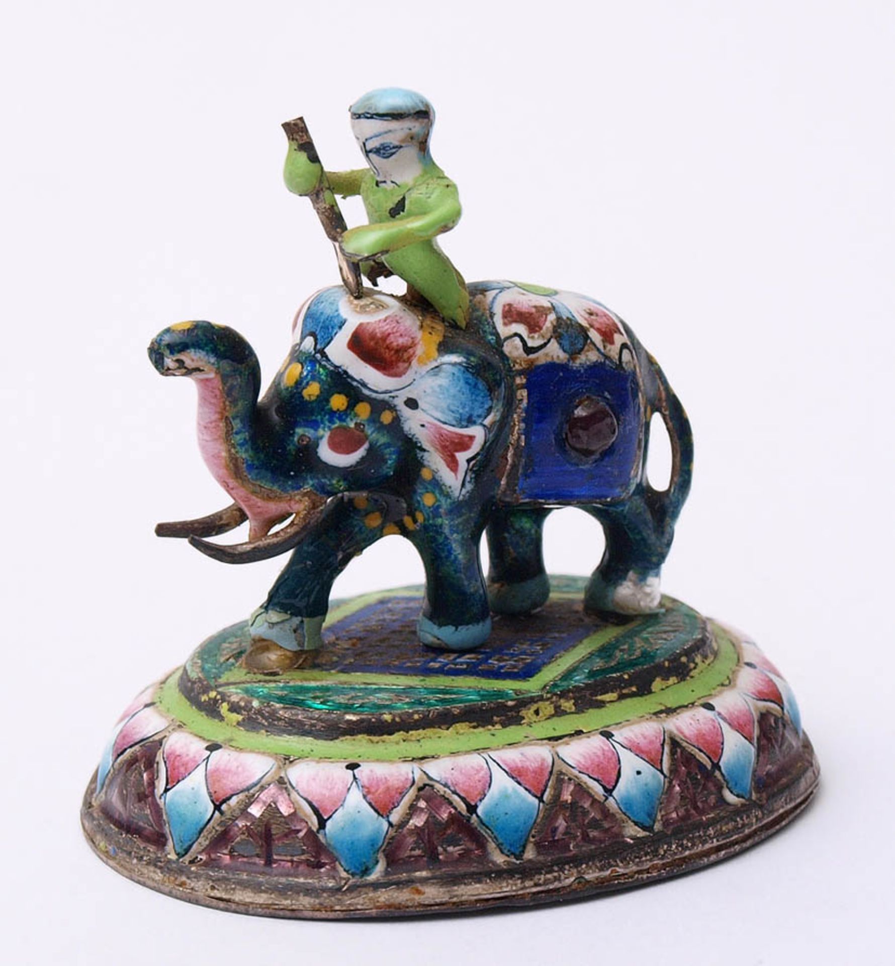 Figurine, indisch Auf ovalem Sockel Elefant mit Mahout. Silber, farbig emailliert, besetzt mit