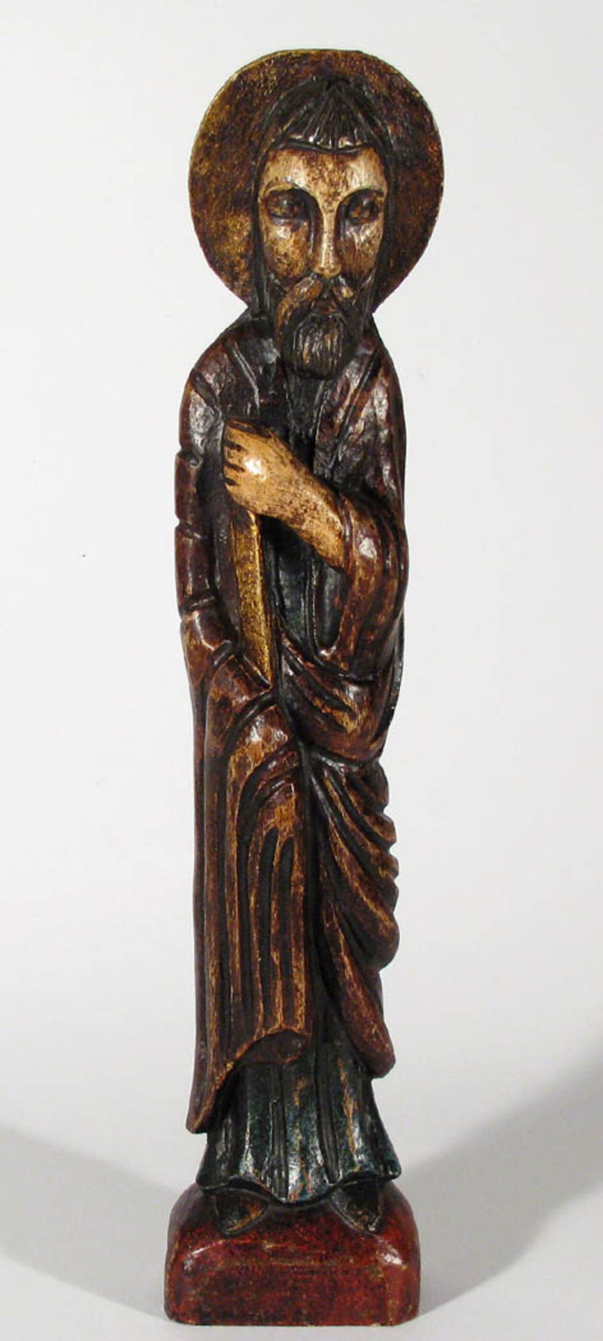 Heiligenfigur, SpanienBärtiger Heiliger, vollplastisch geschnitzt, polychrom bemalt und vergoldet.