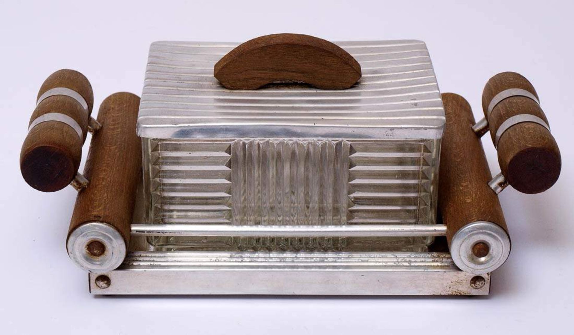 Keksdose, 30er JahreAuf verspiegeltem Tablett mit Holzgriffen und Aluminiumbesatz rechteckige