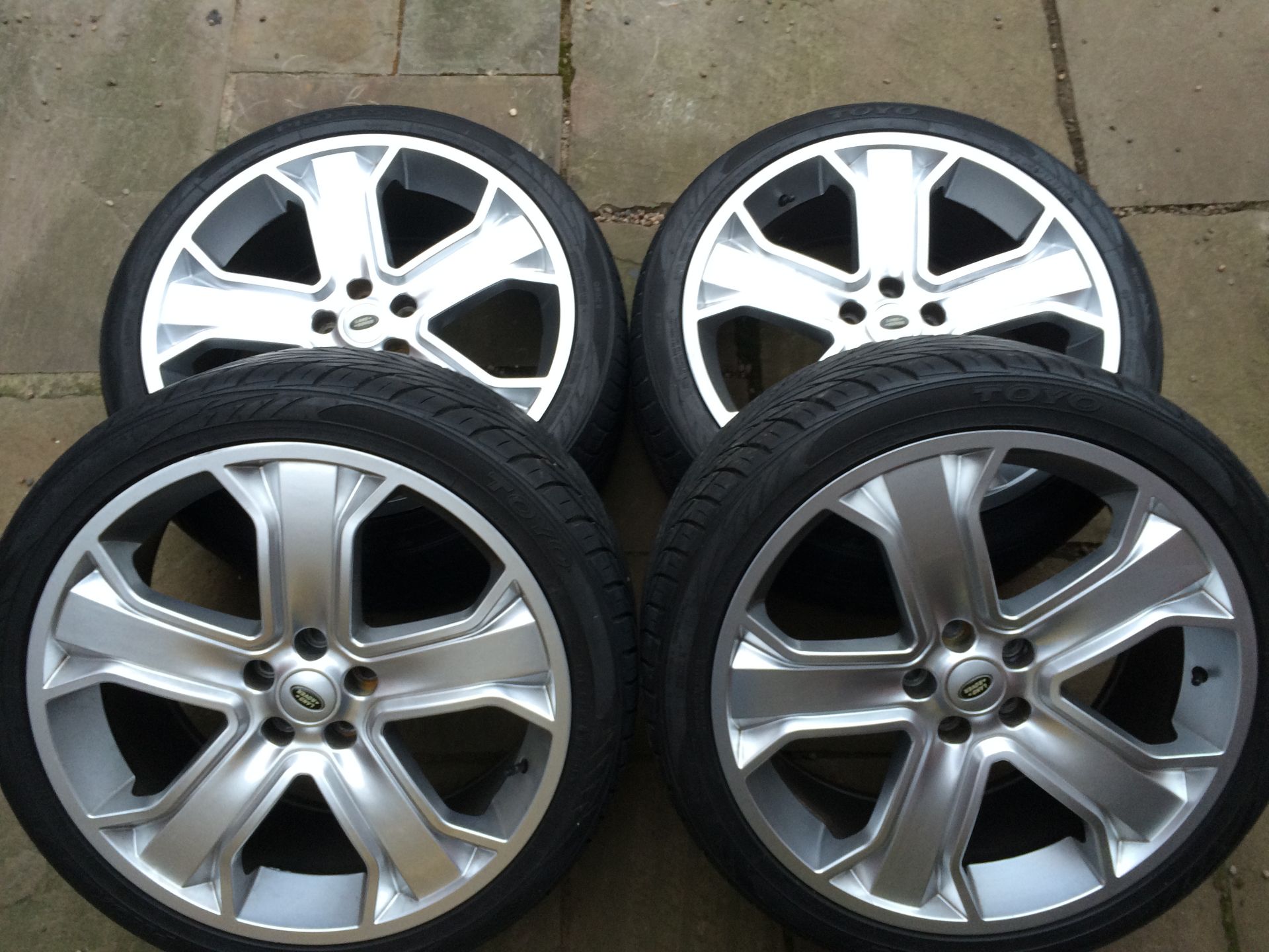 Non Genuine Land Rover, Iron Cross 22” alloy wheels, wrapped in Toyo Proxes S/T’s