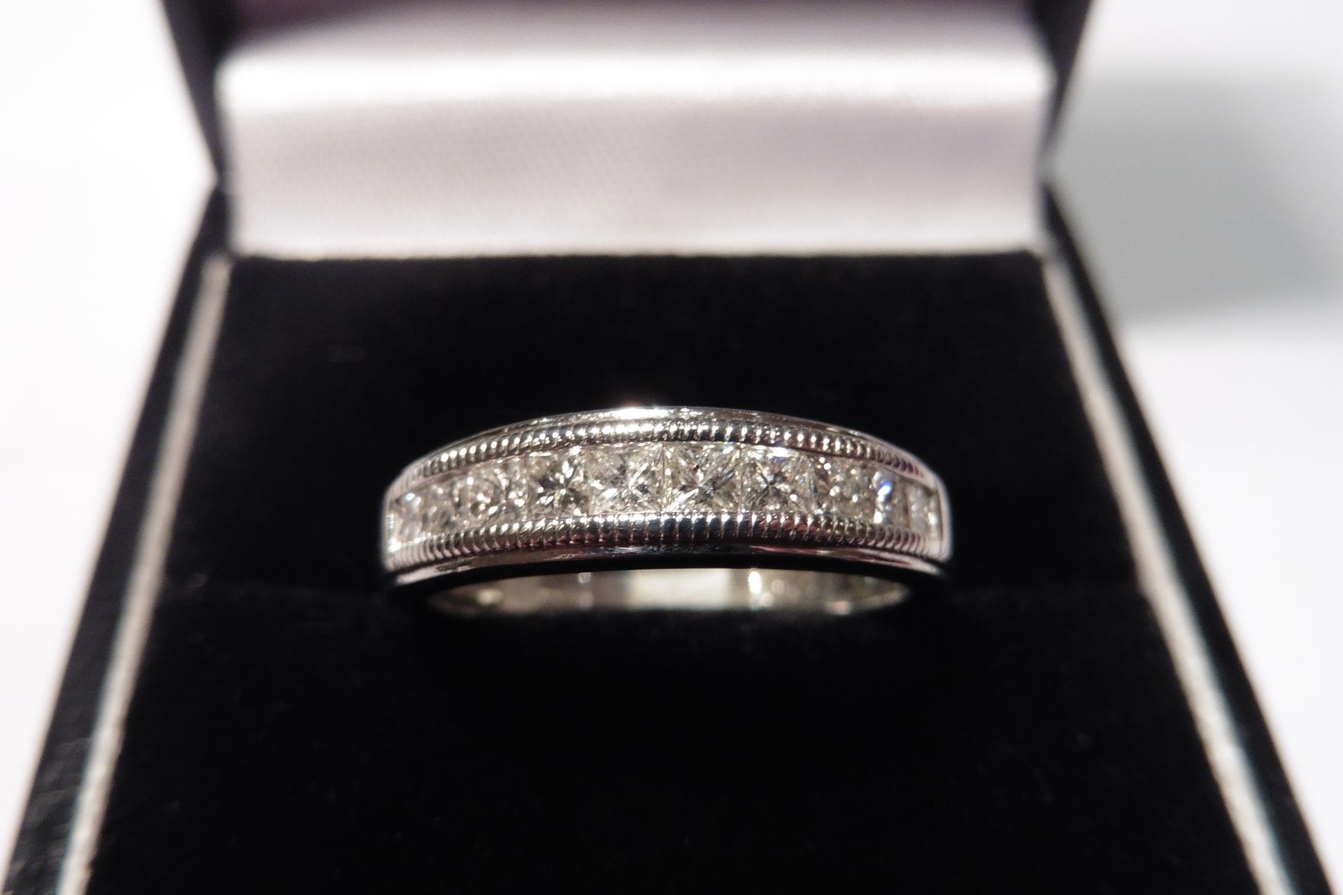 Pre-owned 18ct white gold diamond set eternity style ring, set with 0.50ct, total weight, of princes