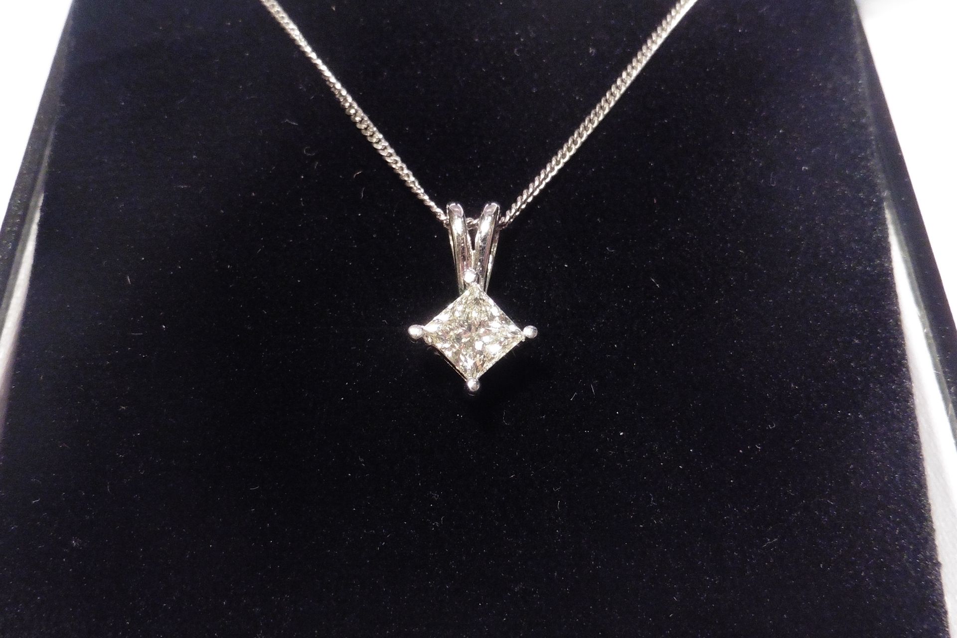18ct white gold diamond solitaire style pendant, set with a single princess cut diamond, of H colour