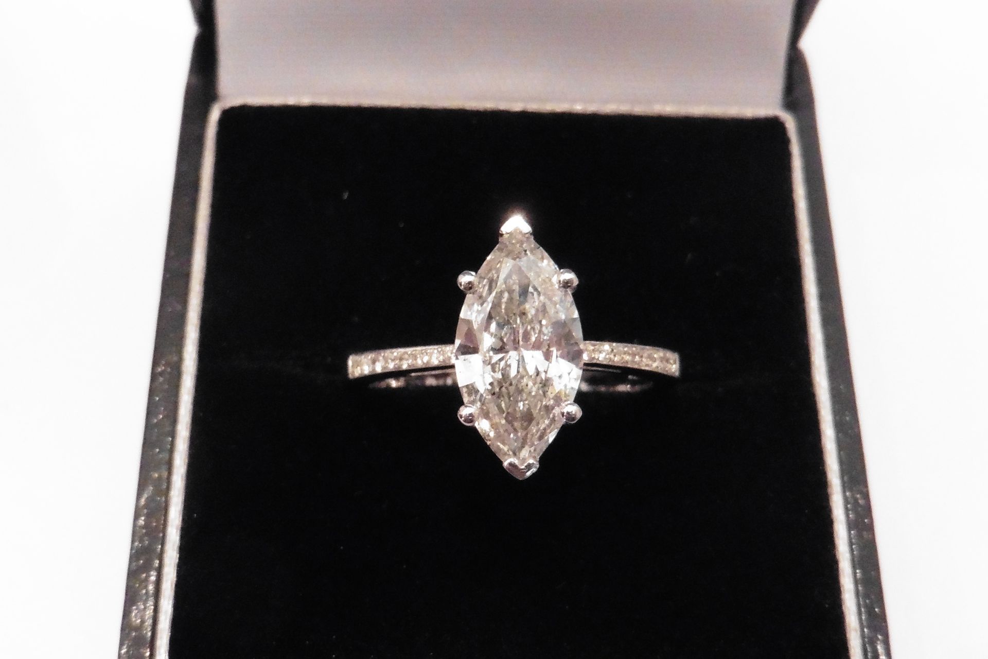 Modern set diamond solitaire ring with a 2.22ct marquise cut diamond, H colour and SI3 clarity.  Sim