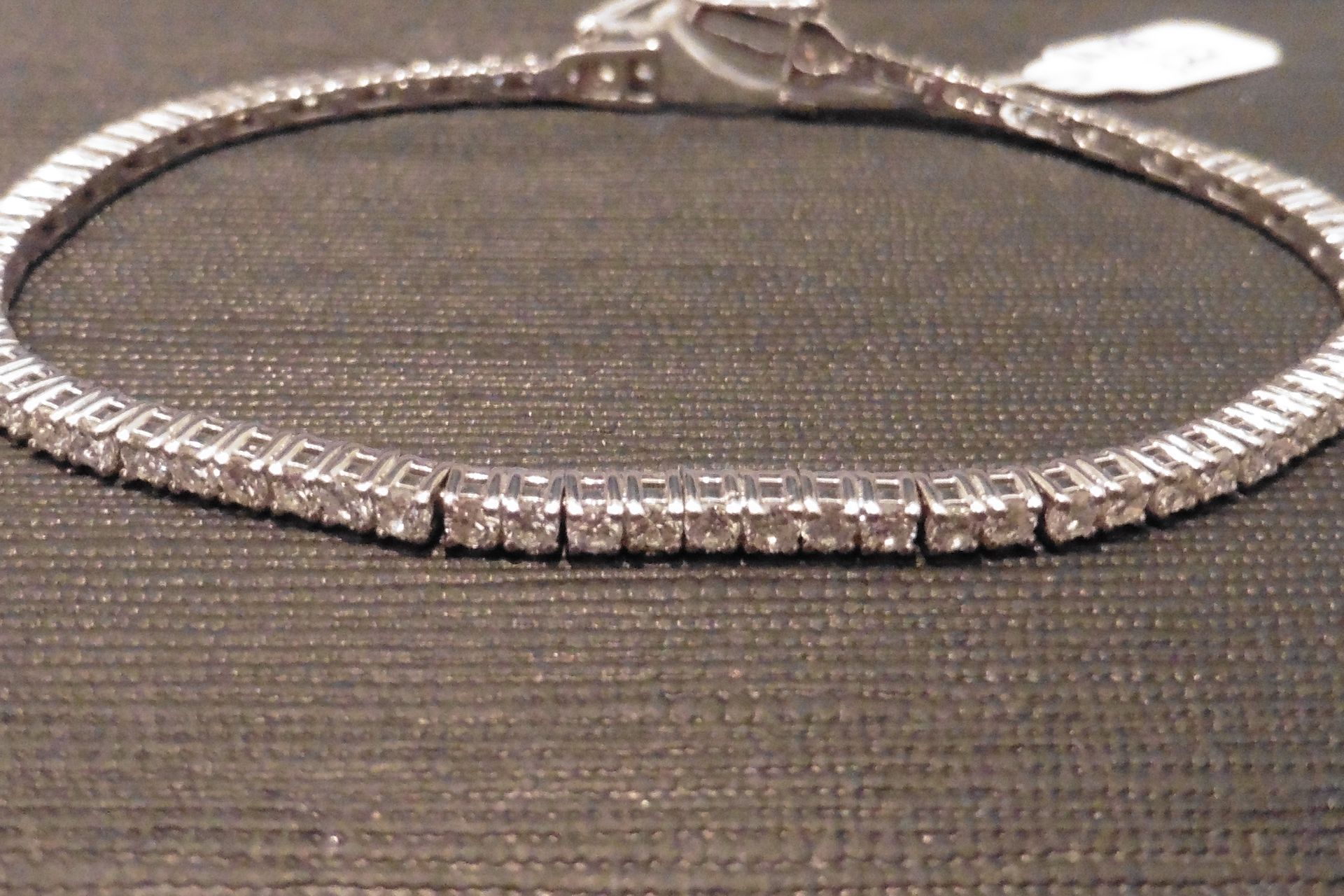 A classical but stunning diamond tennis style bracelet set with top cut diamonds weighing a total of