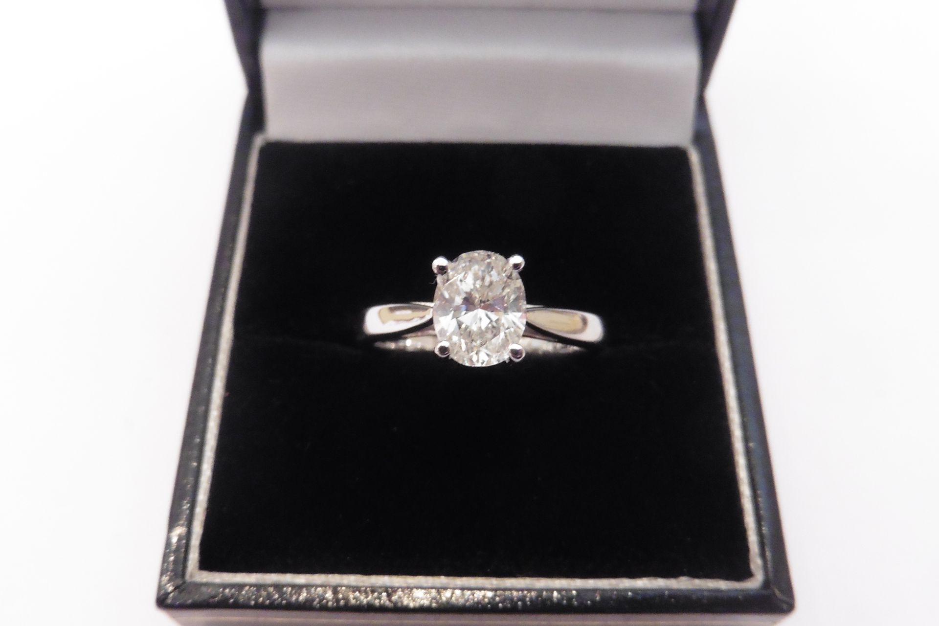 Elegant diamond solitaire ring hosting a beautiful 1.21ct Oval cut diamond of G colour and SI2 clari