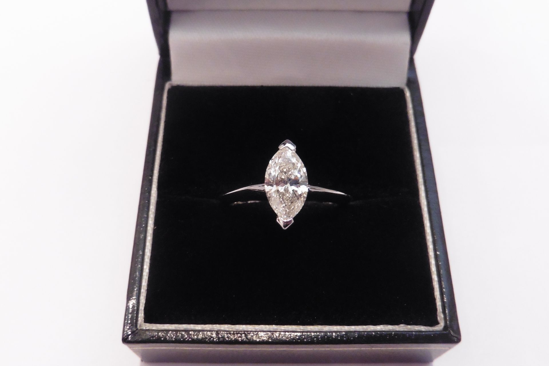 Beautiful tiffany style solitaire set with a sparkling 1.10ct marquise diamond of G colour and SI2 c