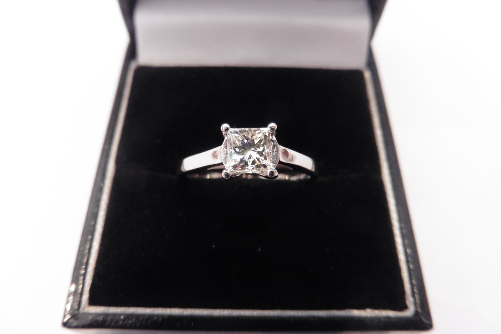 Beautiful diamond solitaire which holds a 0.75ct princess cut diamond, I colour and VS2 clarity.  A