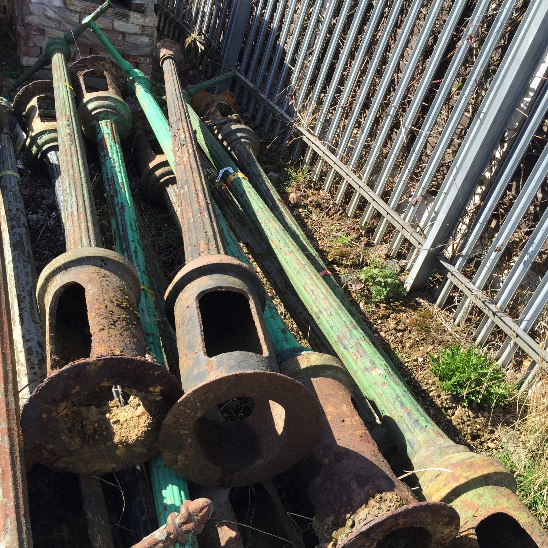 Victorian cast iron lamp post with twin arms 12ft high out of ground.  Originally stood in Sheffield