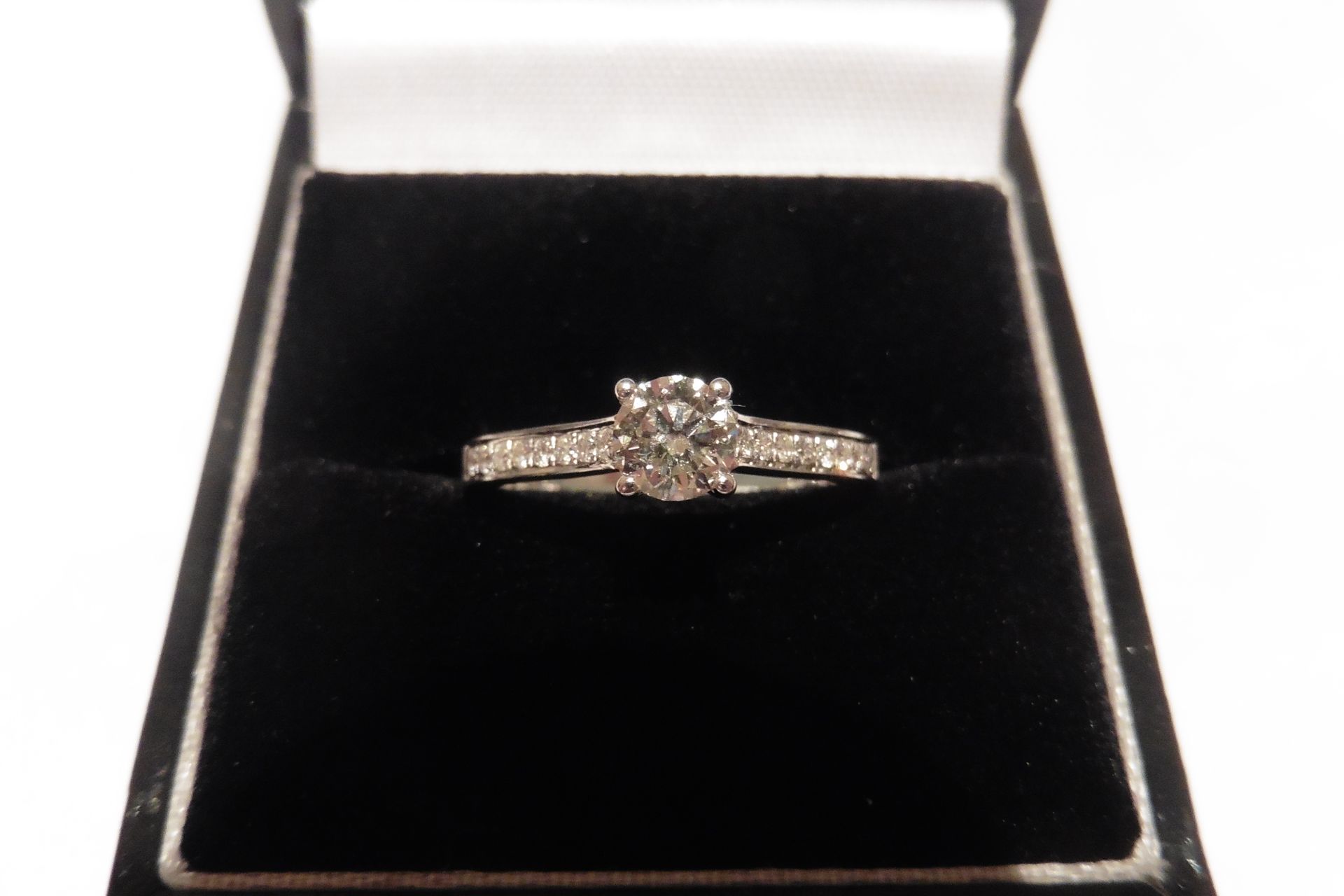 18ct white gold diamond set solitaire ring set with a  russian cut diamond, of VS clarity, I colour