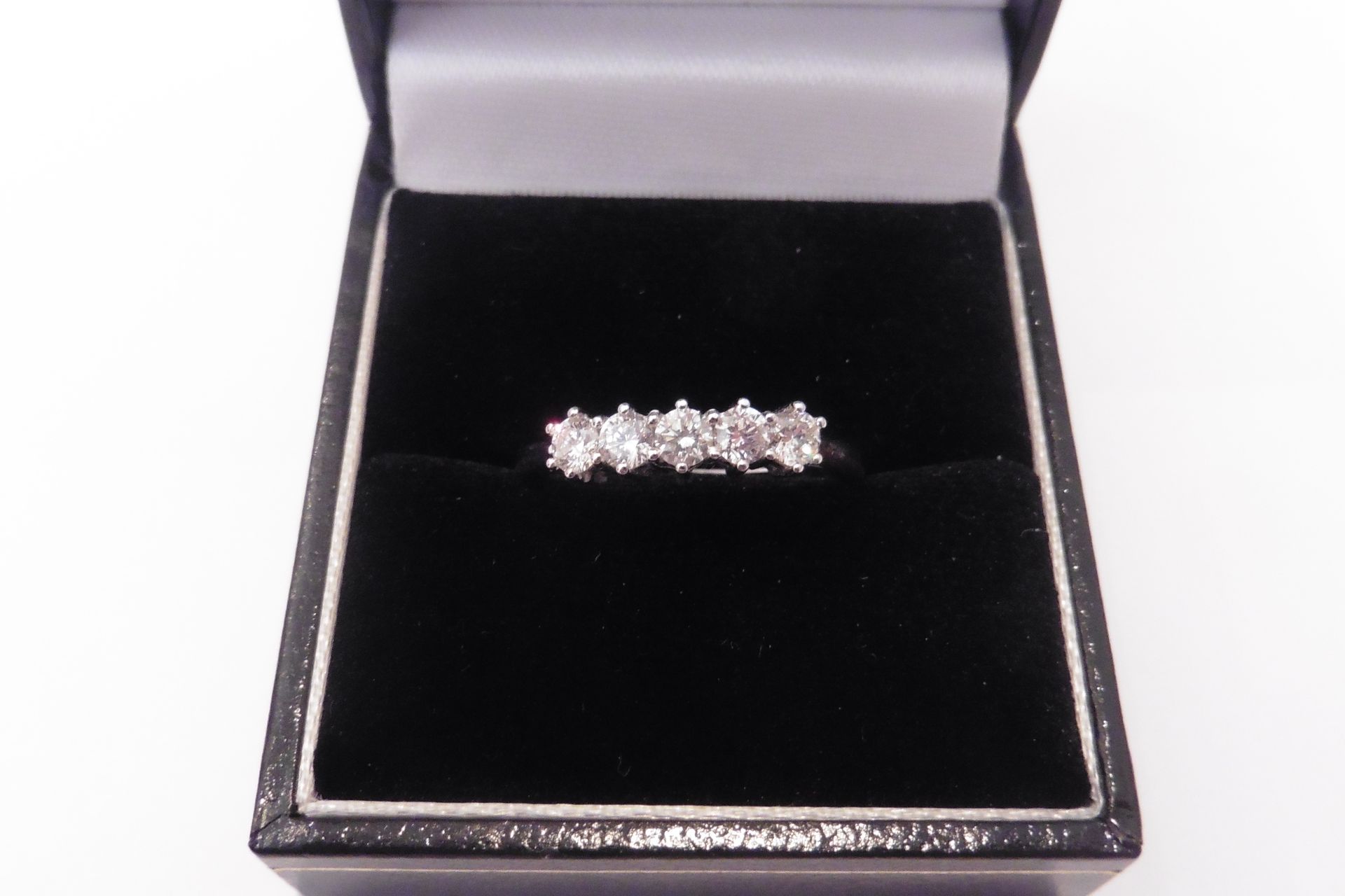 18ct white gold diamond 5 stone ring. Set with 5 small russian cut diamonds of H/I colour and SI cla