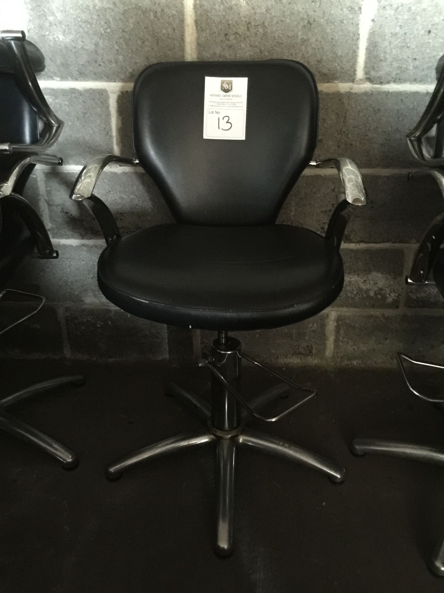 Salon Chair - Adustable height.  Black and Chrome.  Good condition, but in need of a clean.