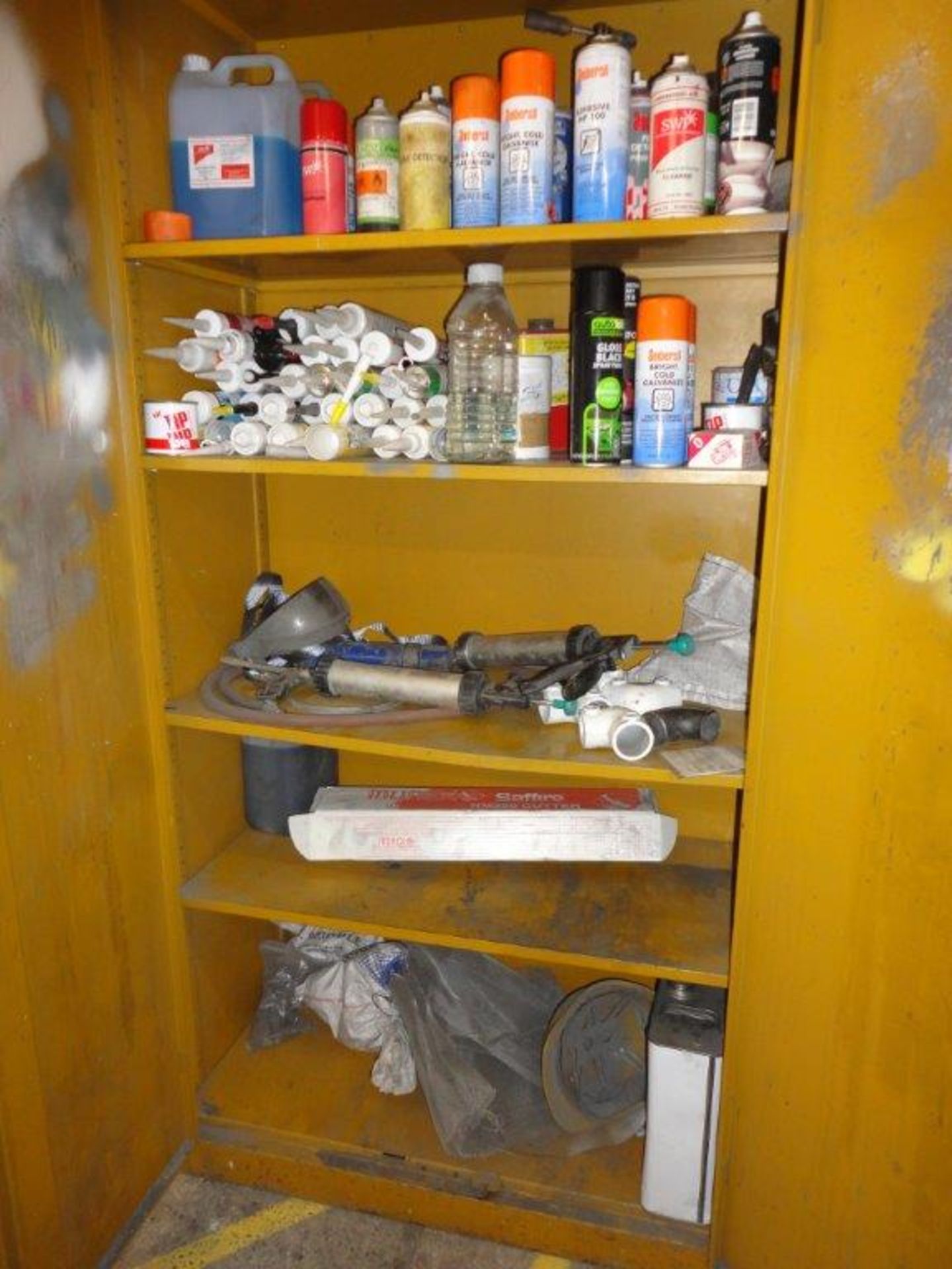 Double door steel cupboard and content