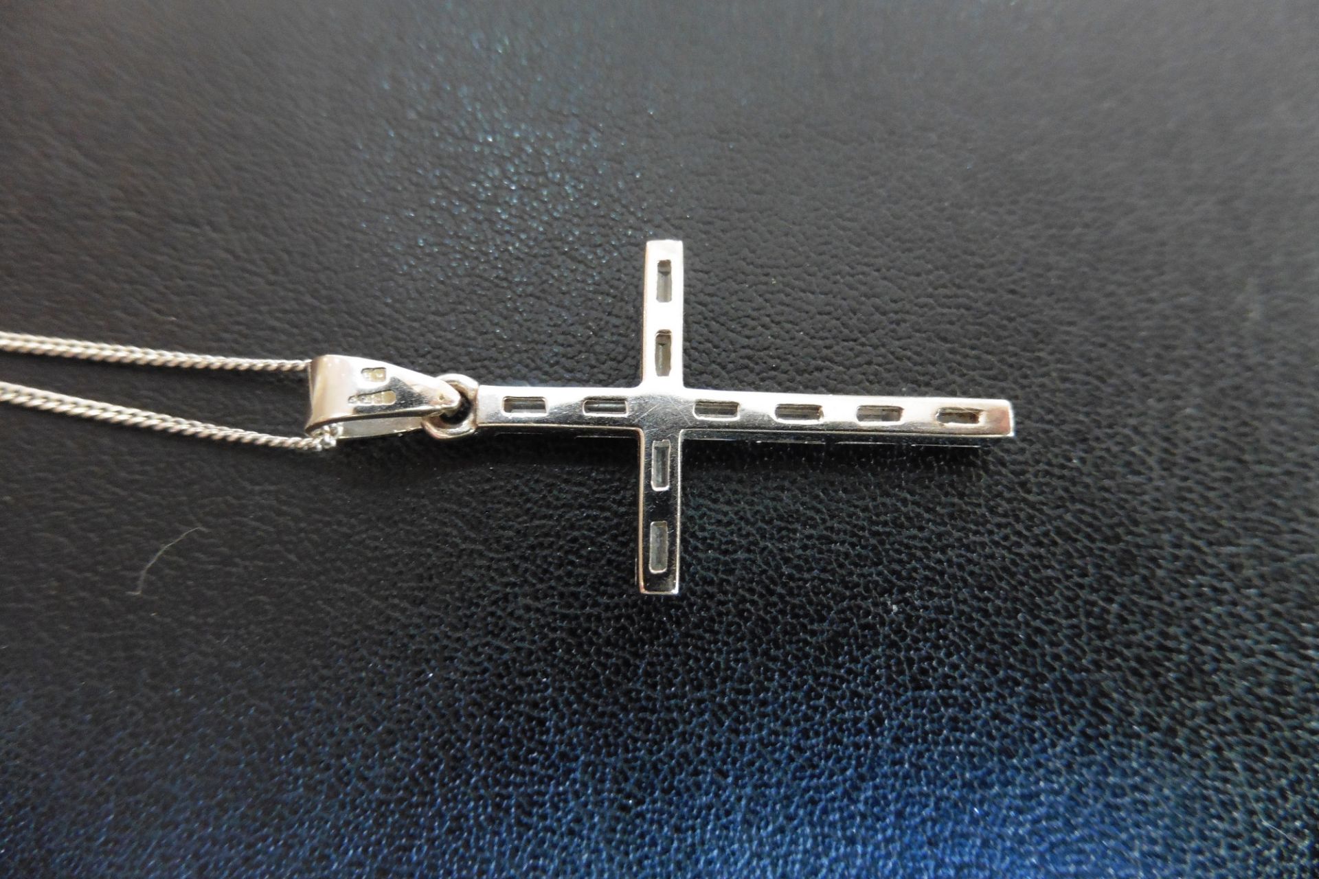 Pre-owned diamond cross pendant set with baguette cut diamonds of H/I colour.  All the diamonds are - Image 2 of 2