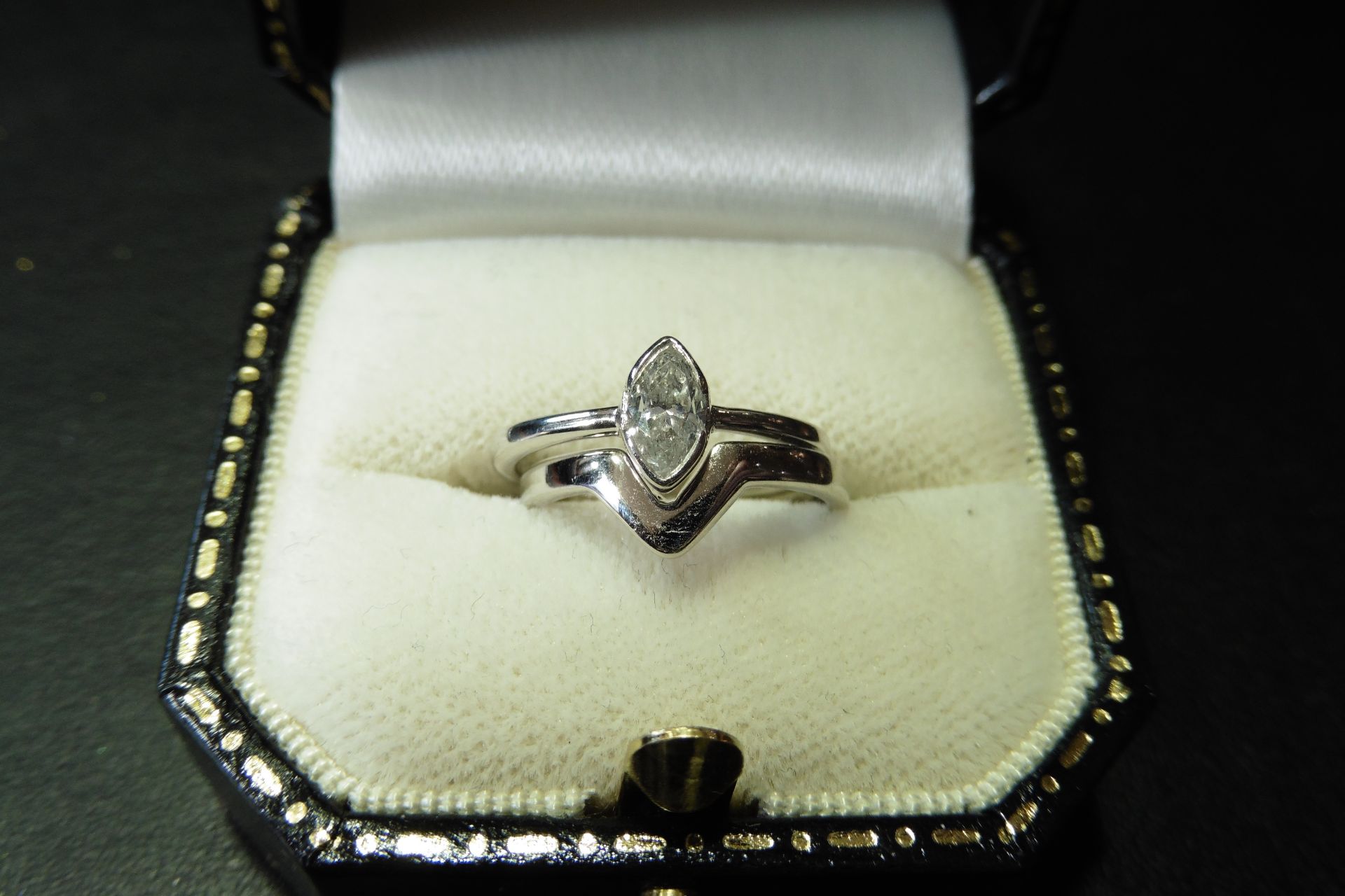 Pre-owned 18ct white gold ring set.  Diamond solitaire set with a 0.50ct marquise cut diamond, J col