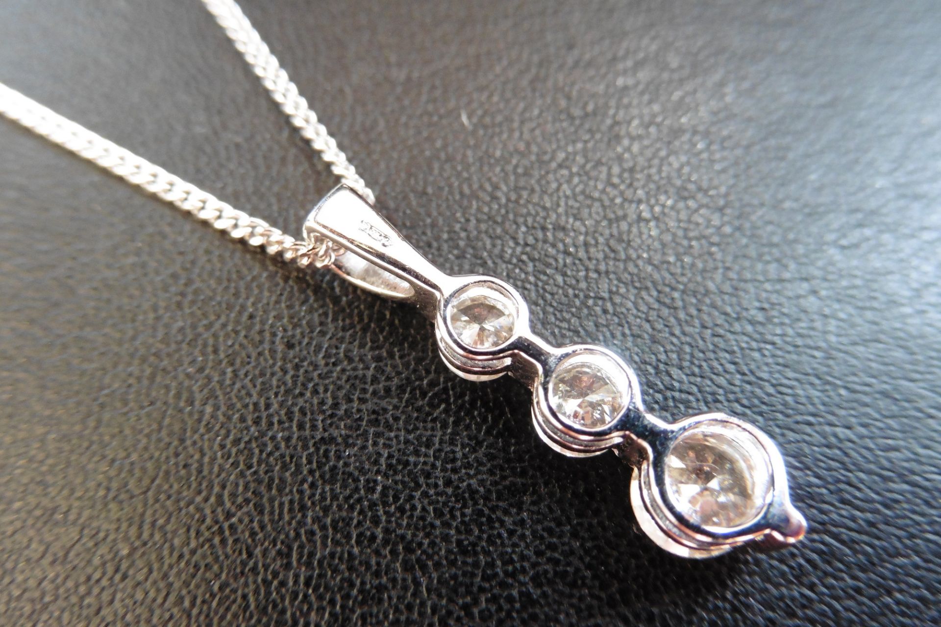 18ct white gold diamond trilogy pendant.  Set with three graduated russian cut diamonds weighing 1.0 - Image 2 of 2