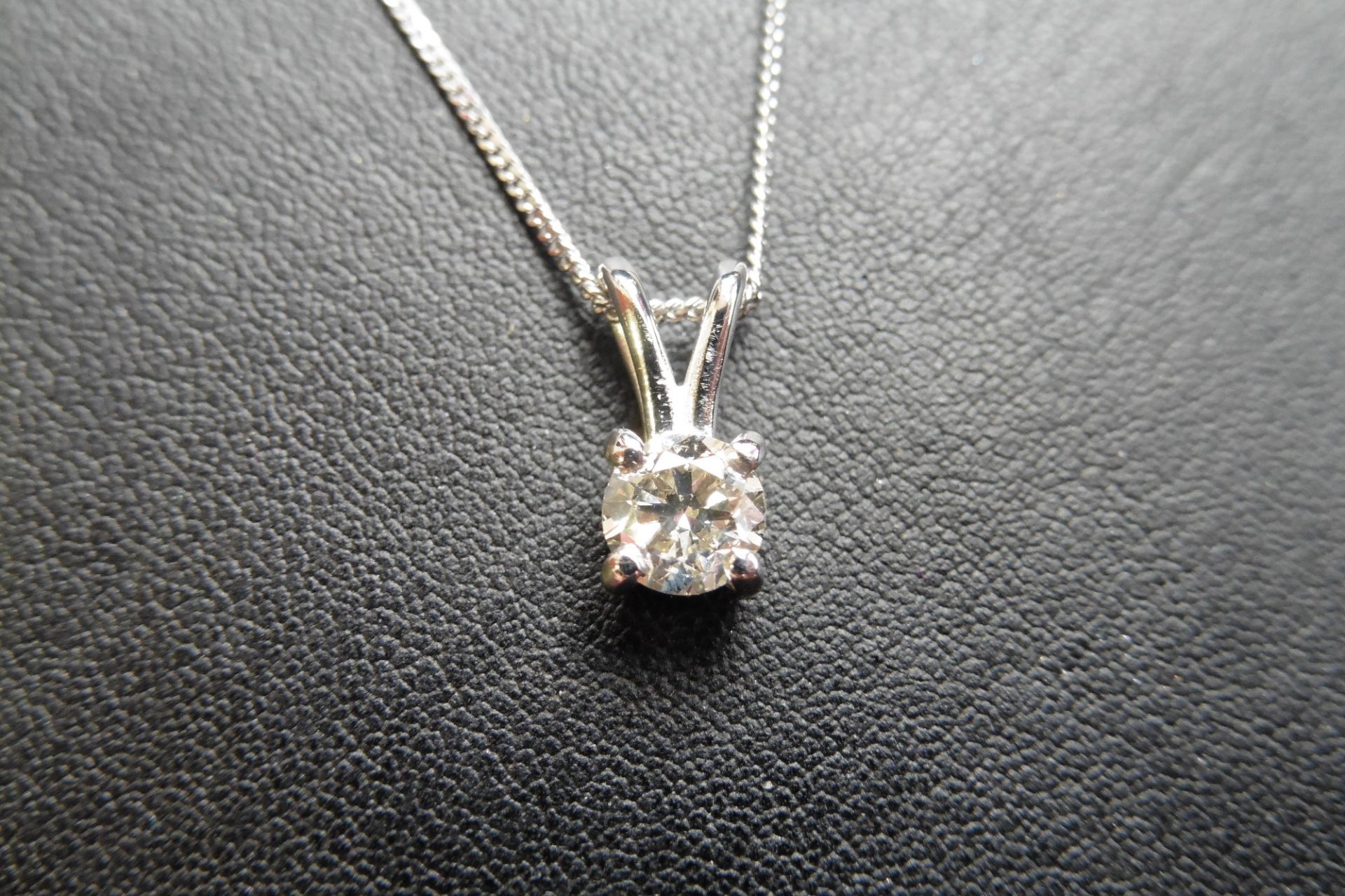 18ct white gold diamond solitaire style pendant set with a single brilliant cut diamond weighing 0.5 - Image 2 of 3