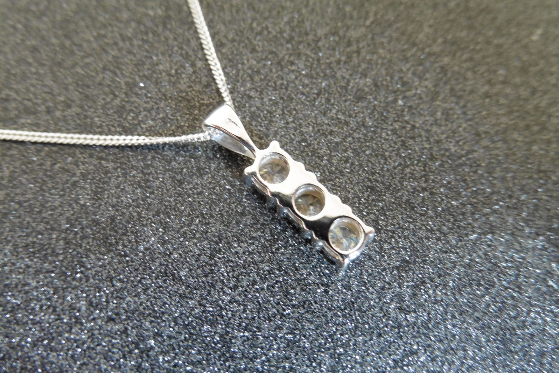 18ct white gold trilogy pendant set with 3 small brilliant cut diamonds of H/I colour weighing a tot - Image 2 of 3