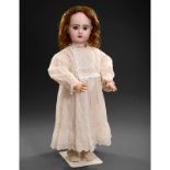 Bébé Jumeau Lioretgraphe Doll, c. 1895
With bisque head impressed "11", fixed brown paperweight