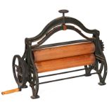 Handcrank-Operated Press Roll
Used to press organ books, cast-iron with wooden barrels, overall