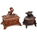 2 Carved Musical Boxes, c. 1900
1) Sewing/jewelry box with carved chamois on lid, blue satin lining,