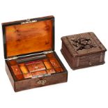 2 Sewing Boxes, c. 1900
1) Black Forest-style carved musical sewing box with floral relief on lid,