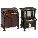 2 Musical Cigarette-Dispensers in the Form of Miniature Harmonia, c. 1890
1) Ebonized model with 2-