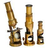 3 Small Drum-Type Microscopes, c. 1880
With original lacquered brass. 1) England, height 6 ¼ in.,