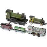 3 Tin Toy Locomotives and 2 Wagons, 1925 onwards
1) Tippco locomotive, clockwork (working), length 6