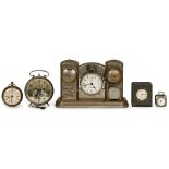 5 Alarm Clocks, 1910 onwards
1) Small cube-shaped travel alarm clock, marked on the reverse "Made in