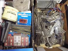 Model Railways - Two boxes containing a large quantity of OO gauge twin rail track to include