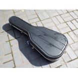 A Hiscox hard shell acoustic guitar case