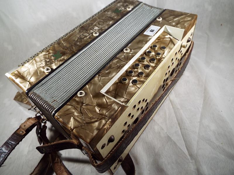 A vintage Mastertone German piano accordion in hard case - included in the lot are four music books - Image 2 of 2