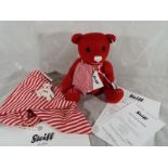 A Steiff Filzteddybar, red, issued in a limited edition (No 390),
